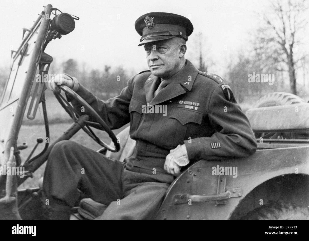 general-dwight-d-eisenhower-seated-in-a-jeep-on-his-way-to-deliver-EKP713.jpg
